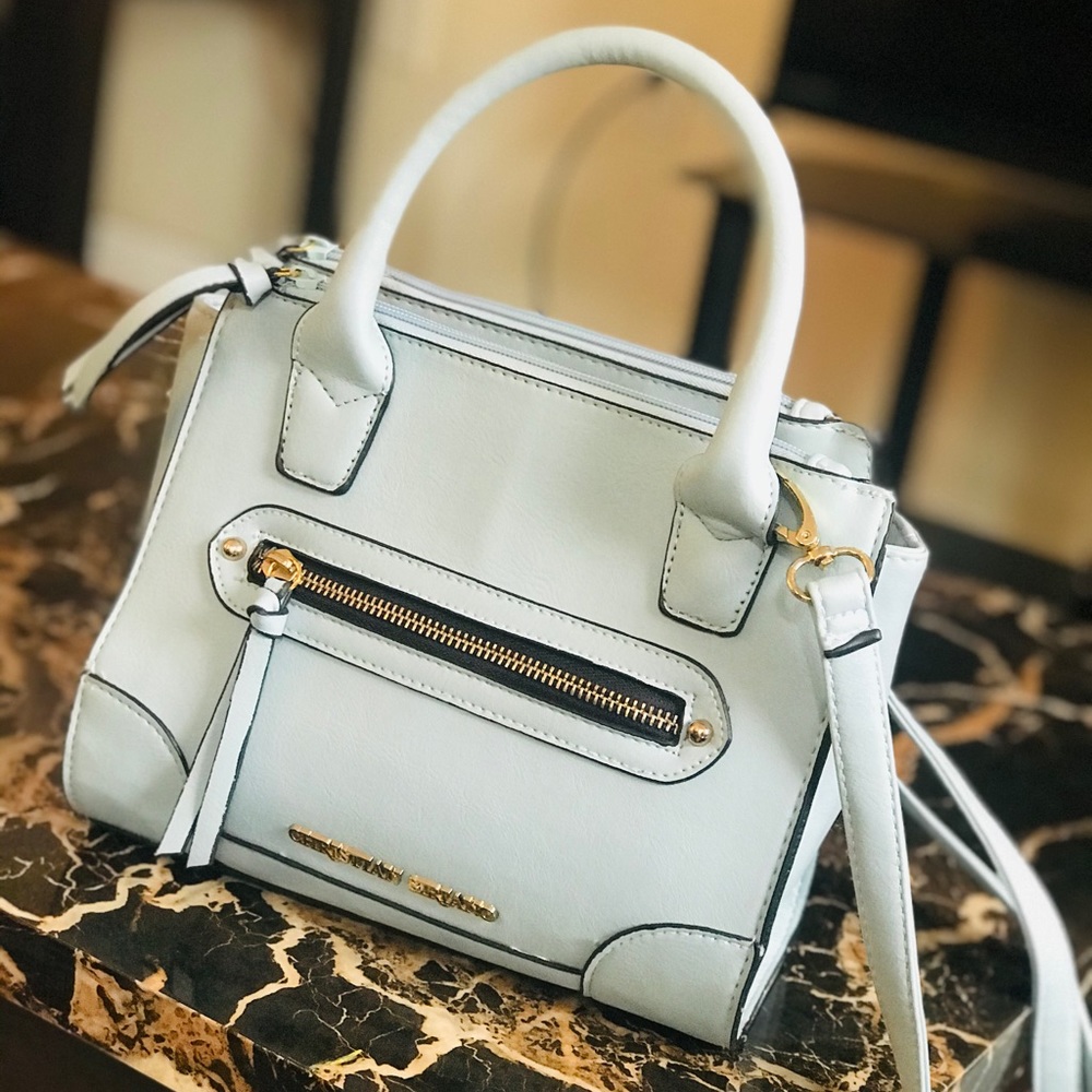 Christian Serrano purses